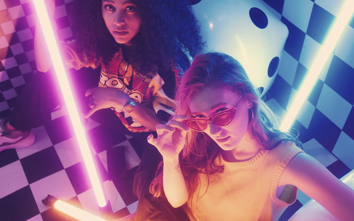 Urban girls between bars of colored light 1 urban girls between bars of colored light